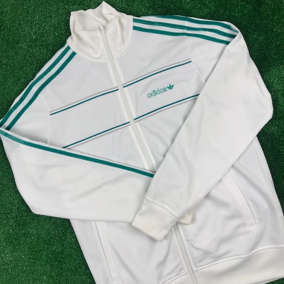 white adidas jacket with green stripe